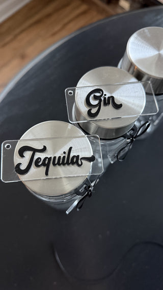 Set of 4 light-weight plastic bottles with liquor tags RCD|122964