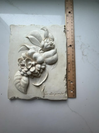 HenFeathers cast stone wall plaque