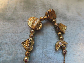 Gold tone necklace with slider pendants RCD|134443