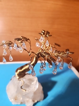 Beautiful handmade swarovski crystal tree on a huge quartz crystal base