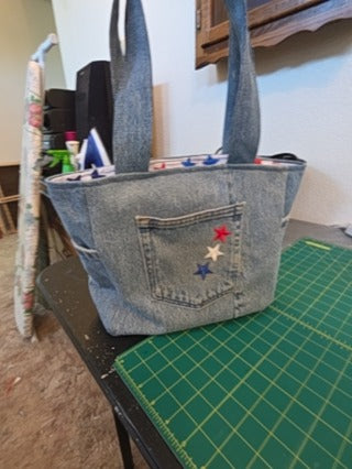 Recycled denim bag with star patches