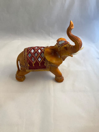 Medium size resin elephant with trunk up