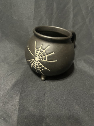 Black coffee cup with white spiderweb rsv
