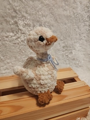 Goose: Crocheted- tan/ cream, blue bow. Super soft yarn!