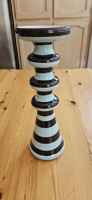 14" Tall candle holder/pedistal distinctive striped pattern in brown and light blue, with a stacked, rounded, and tapered shape.  RSVL|111556