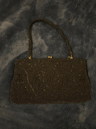 Vintage beaded evening bag features intricate glass beadwork Made in Japan