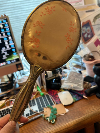 Vintage (1940-50) Gold tone oval mirror w/rose decor on back, w/handle 13.75"|61815