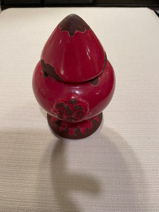 Red decorative jar with lid