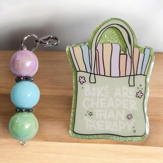 Interchangeable Badge Reel Charm: Books Are Cheaper Than Therapy. RSV|84492
