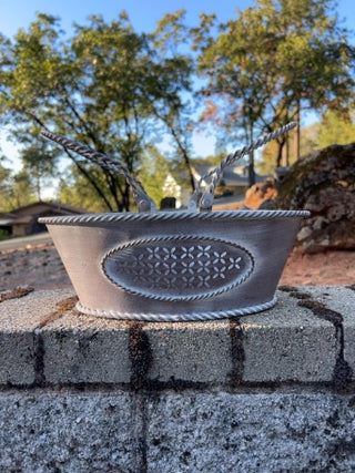 distressed white metal oval basket punch out details