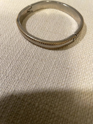 Silvertone with gold band clasp bangle bracelet