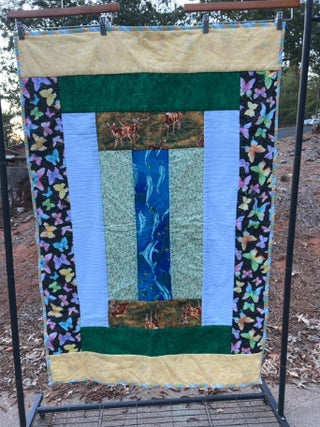 Handmade children’s quilt or tummy pad