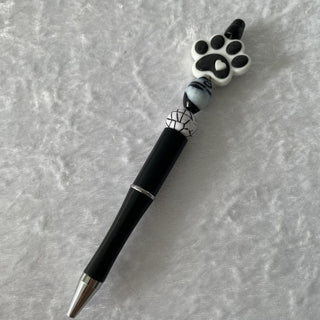 handmade beaded pen, black w/ pawprint RSV
