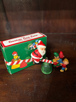 VTG 1983 Avon Santa's See Saw orn. NM|132637