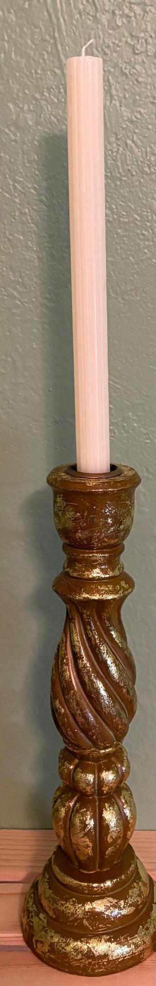 Gold candle stick holder with candle|133885
