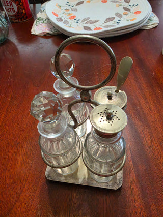 Cruet Set, and Silver Plated Holder/sm chip on 2 bottles