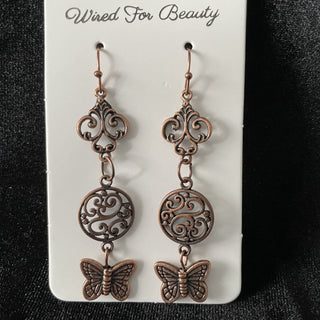 Earrings, antique copper butterfly dangle RSV