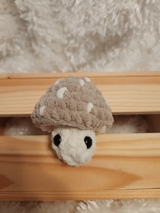 Mushroom Fidget Popper: Crocheted tan, cream colored