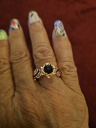 Goldtone w/Black Stones Ring Size 7