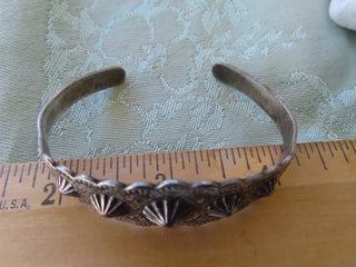 Silver tone cuff bracelet w/conchos RCD|122504