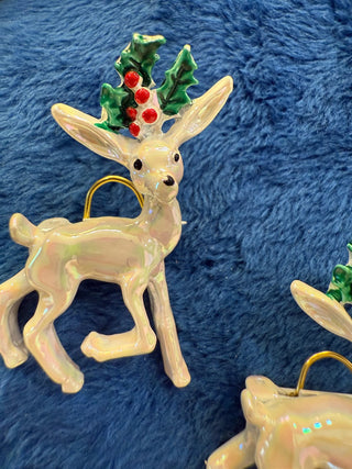 White reindeer brooches