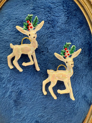 White reindeer brooches