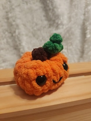 Medium Happy Pumpkin: Crocheted. Orange, brown, green, black