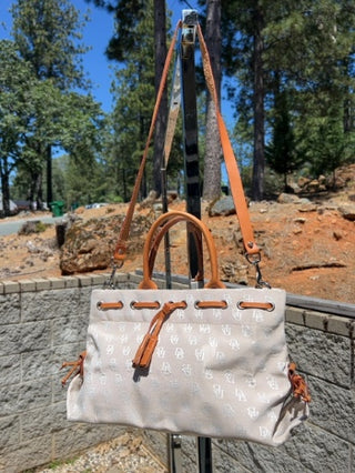 Vintage Y2K Dooney & Bourke logo monogram tote crossbody satchel bag in beige canvas brown leather trim