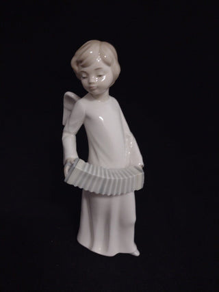 NAO by Lladro Angel playing an accordion rcd