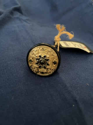 Large black and gold ring