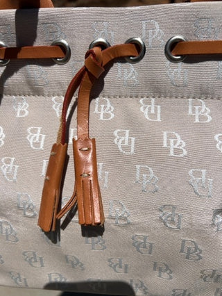 Vintage Y2K Dooney & Bourke logo monogram tote crossbody satchel bag in beige canvas brown leather trim