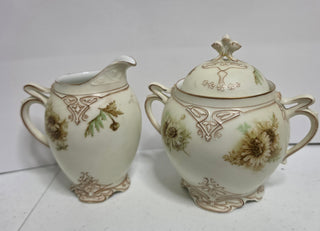 Antique German porcelain sugar and creamer set with lid
