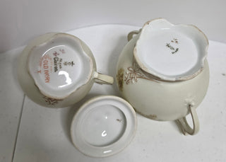 Antique German porcelain sugar and creamer set with lid