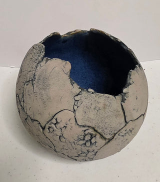 Sphere shaped ceramic pottery