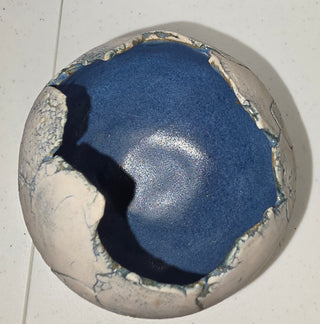 Sphere shaped ceramic pottery