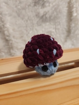 Mushroom Fidget Popper: Crocheted wine red/ light blue