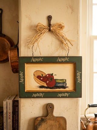Cottagecore painting apples in a basket