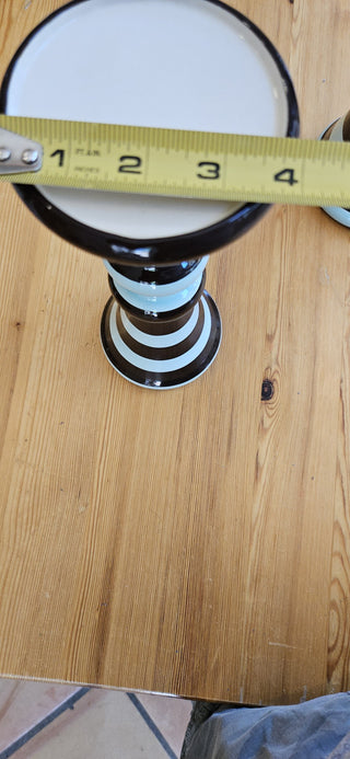 11" Tall candle holder/pedistal distinctive striped pattern in brown and light blue, with a stacked, rounded, and tapered shape.  RSVL|111554