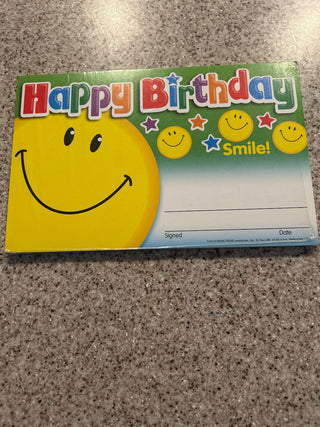 Happy birthday certificate with smiley faces