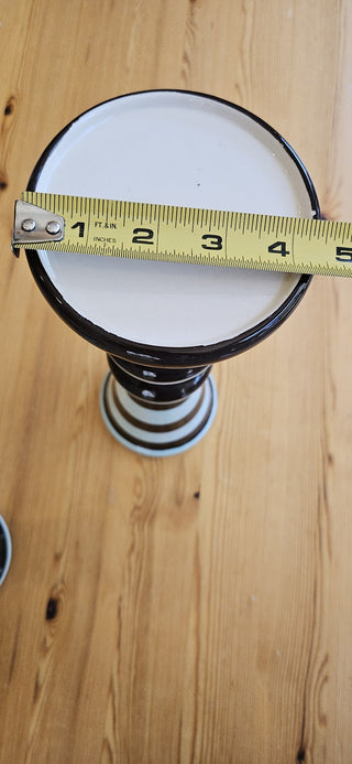 14" Tall candle holder/pedistal distinctive striped pattern in brown and light blue, with a stacked, rounded, and tapered shape.  RSVL|111559
