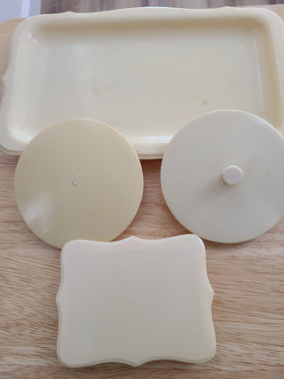 7 1940s Yellow Bakelite pieces: 1 tray, 1 nail buffing set, 3 lids, 1 ring box bottom|58139