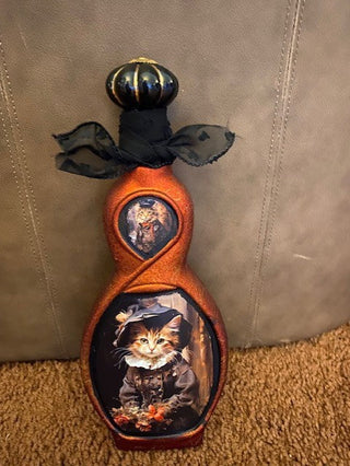 Victorian lady cat bottle