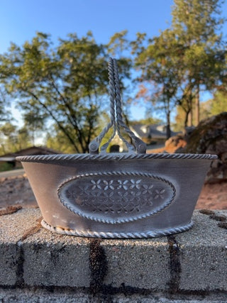 distressed white metal oval basket punch out details