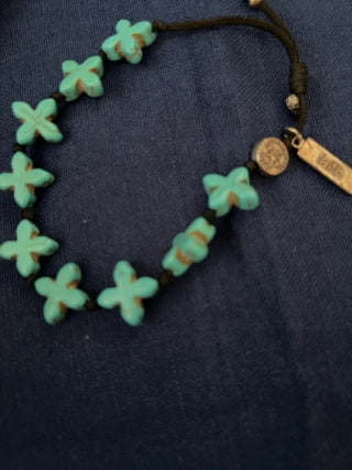 Turquoise  Saints bracelet w/ “faith” charm
