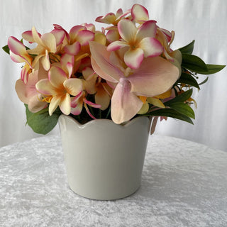 spring floral arrangement in white vase RSV