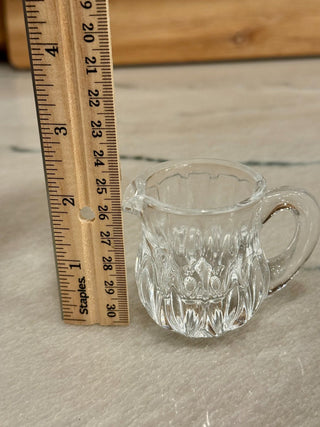 Sm glass pitcher 2" matches