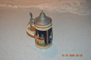 small vintage stein with pewter lid