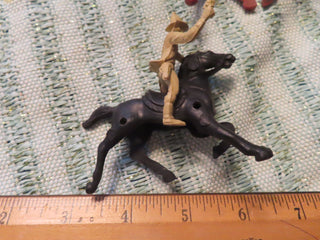 Black horse & tan cowboy