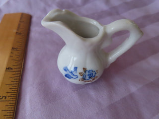 small porcelain flower pitcher