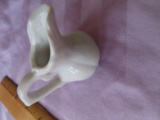 small porcelain flower pitcher